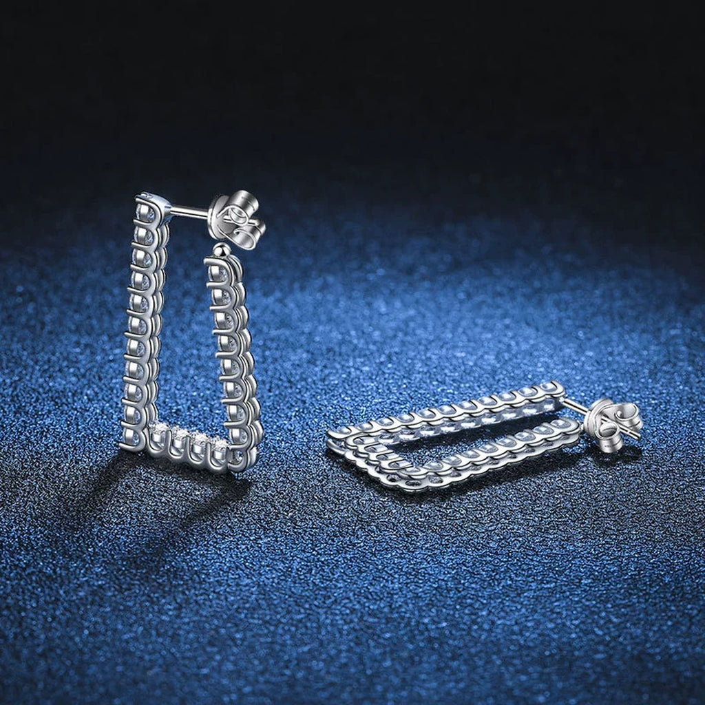 Pave Moissanite Hoop Earrings in White Gold-Plated S925 Sterling Silver blue scene angled view