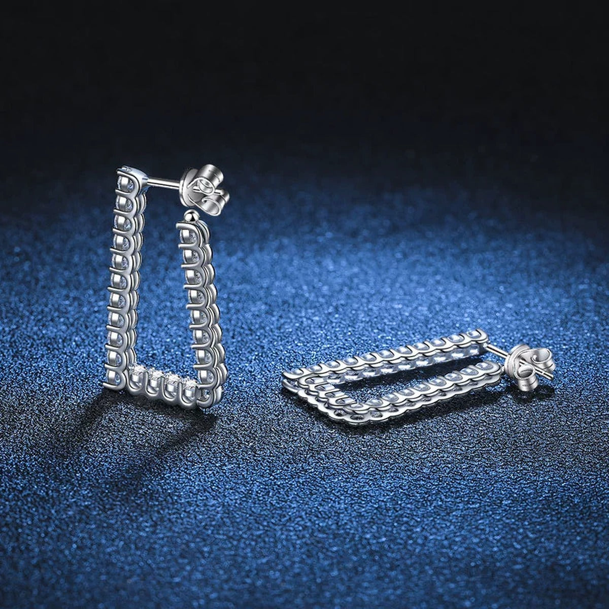 Pave Moissanite Hoop Earrings in White Gold-Plated S925 Sterling Silver blue scene angled view
