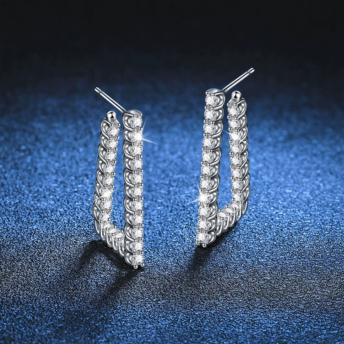 Pave Moissanite Hoop Earrings in White Gold-Plated S925 Sterling Silver blue scene close-up view
