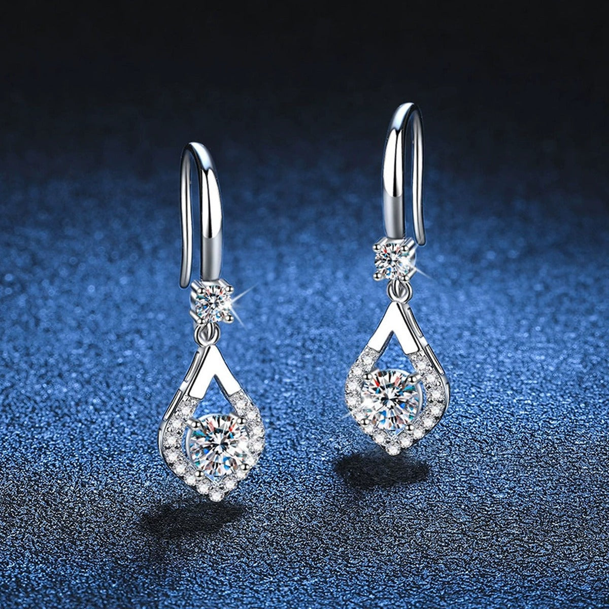 Pear Moissanite Drop Earrings with CZ in White Gold-Plated S925 blue scene angled view