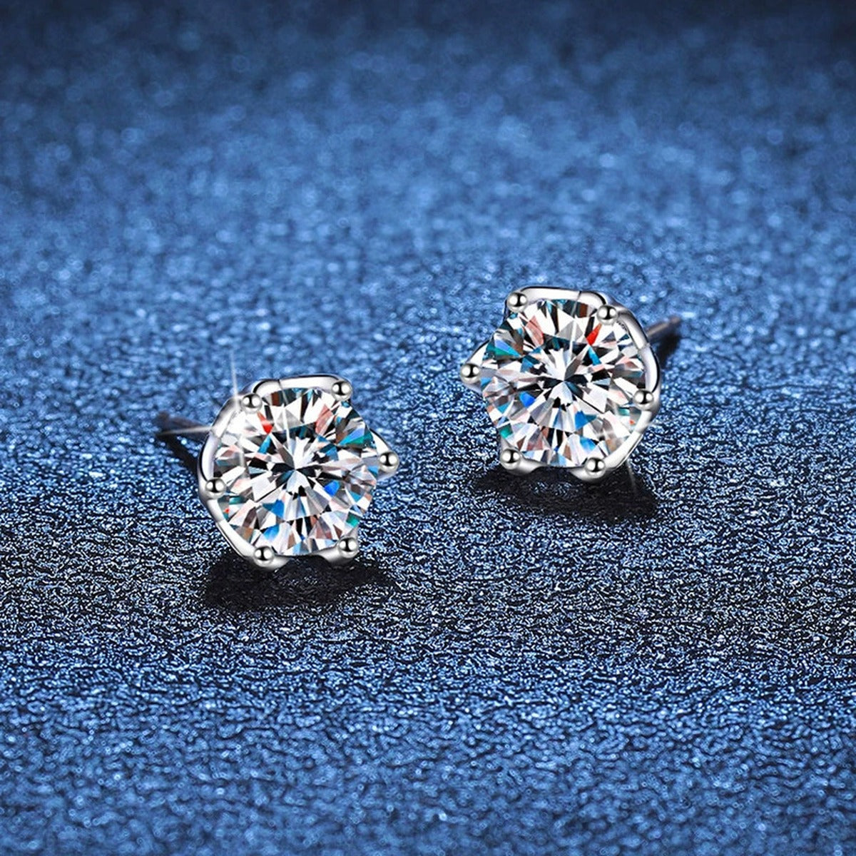 Snowflake Moissanite Stud Earrings in White Gold-Plated S925 Silver blue scene angled view