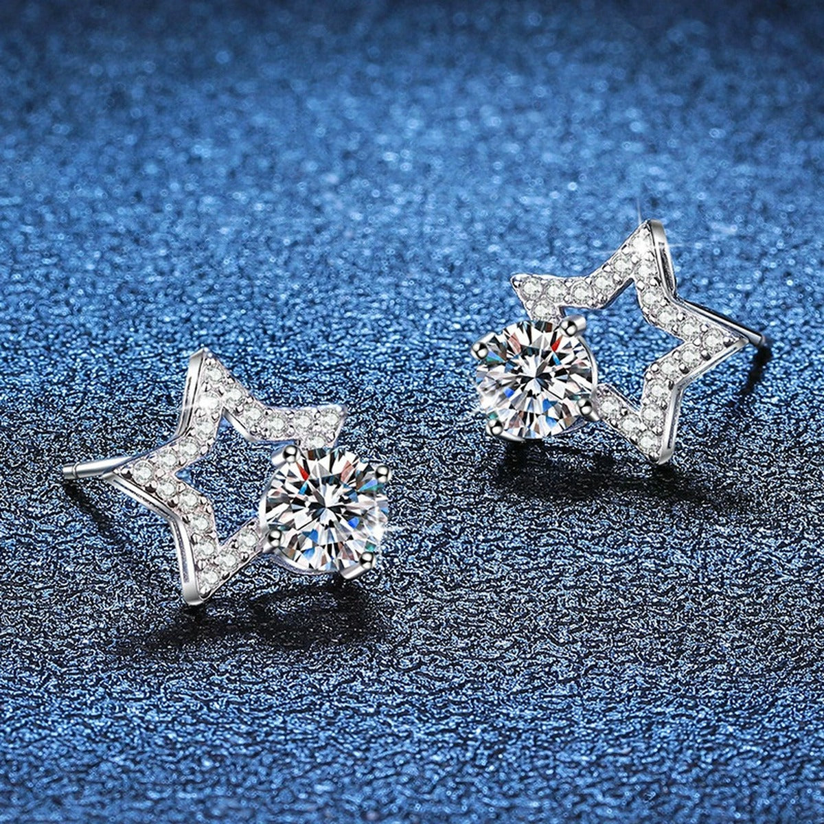 Star Moissanite Stud Earrings with CZ in White Gold-Plated S925 Silver blue scene close-up view