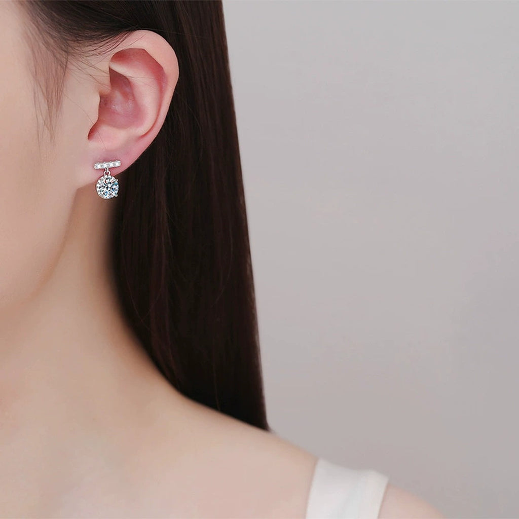 Round Halo Moissanite Stud Earrings with CZ in White Gold-Plated S925 worn on ear by model