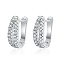 Pave Moissanite Hoop Earrings in White Gold-Plated S925 Sterling Silver on clean white background showing pave huggie hoops with a bright double-row front