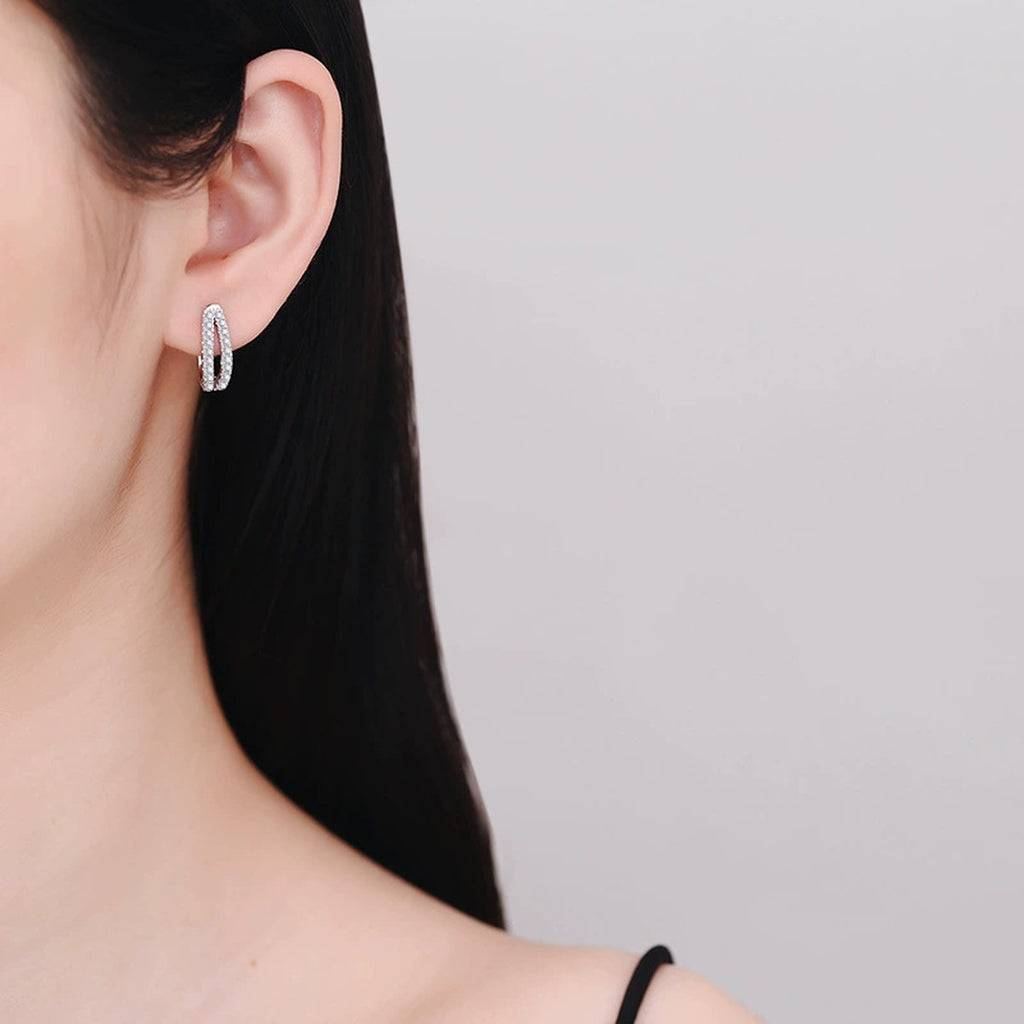 Pave Moissanite Hoop Earrings in White Gold-Plated S925 Sterling Silver worn on ear by model
