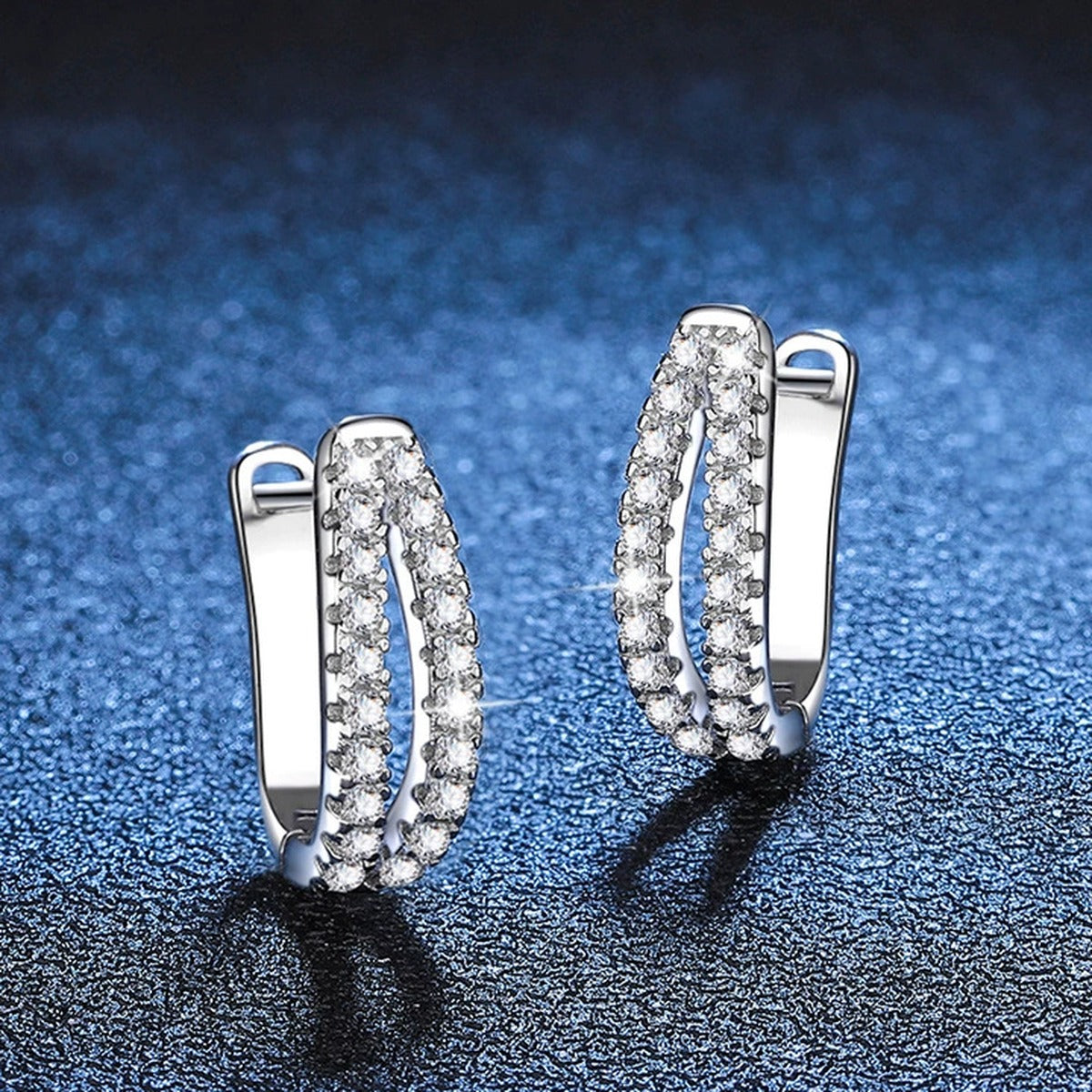 Pave Moissanite Hoop Earrings in White Gold-Plated S925 Sterling Silver blue scene close-up view
