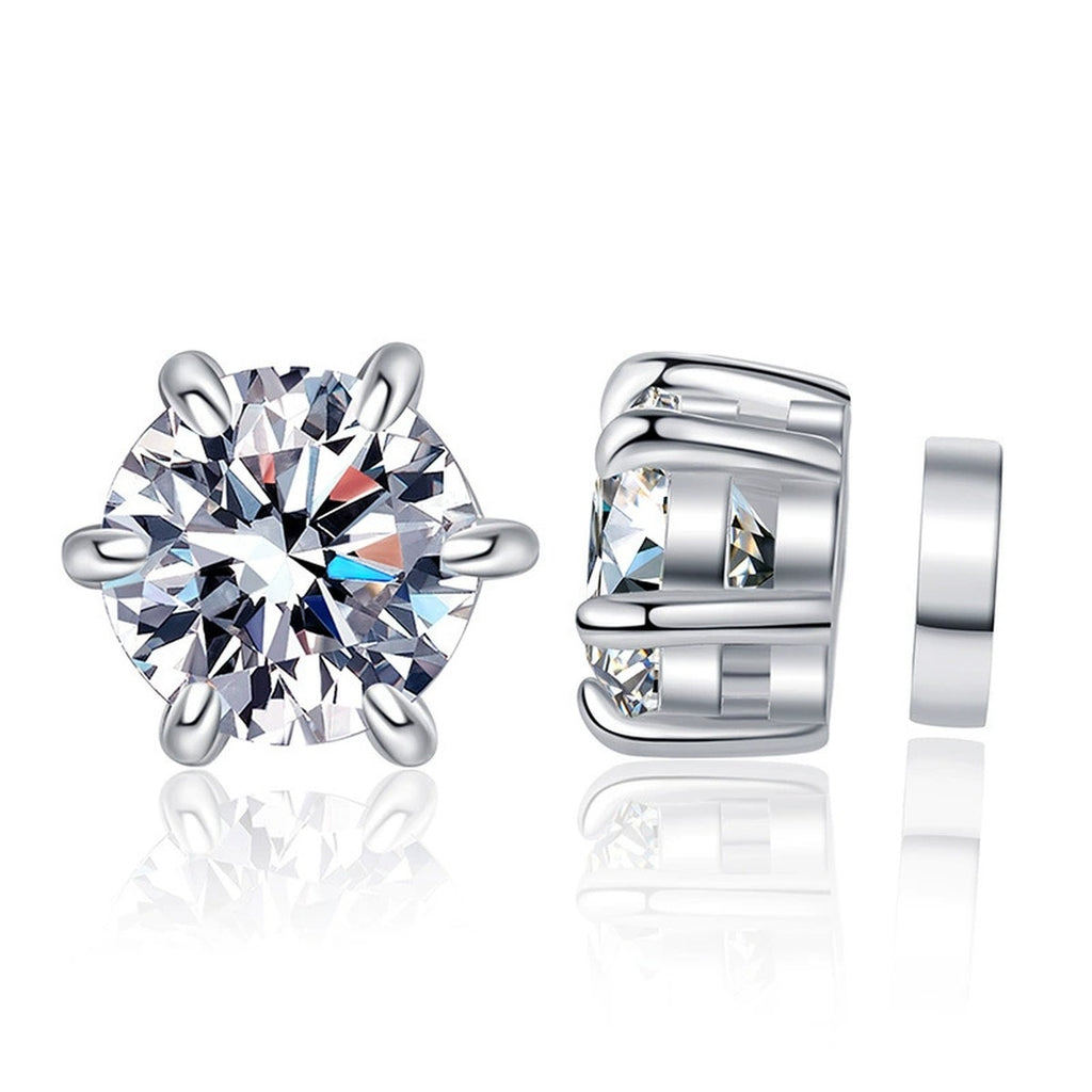 Round Moissanite Huggie Earrings in White Gold-Plated S925 Silver on clean white background showing compact huggie earrings with a round moissanite center