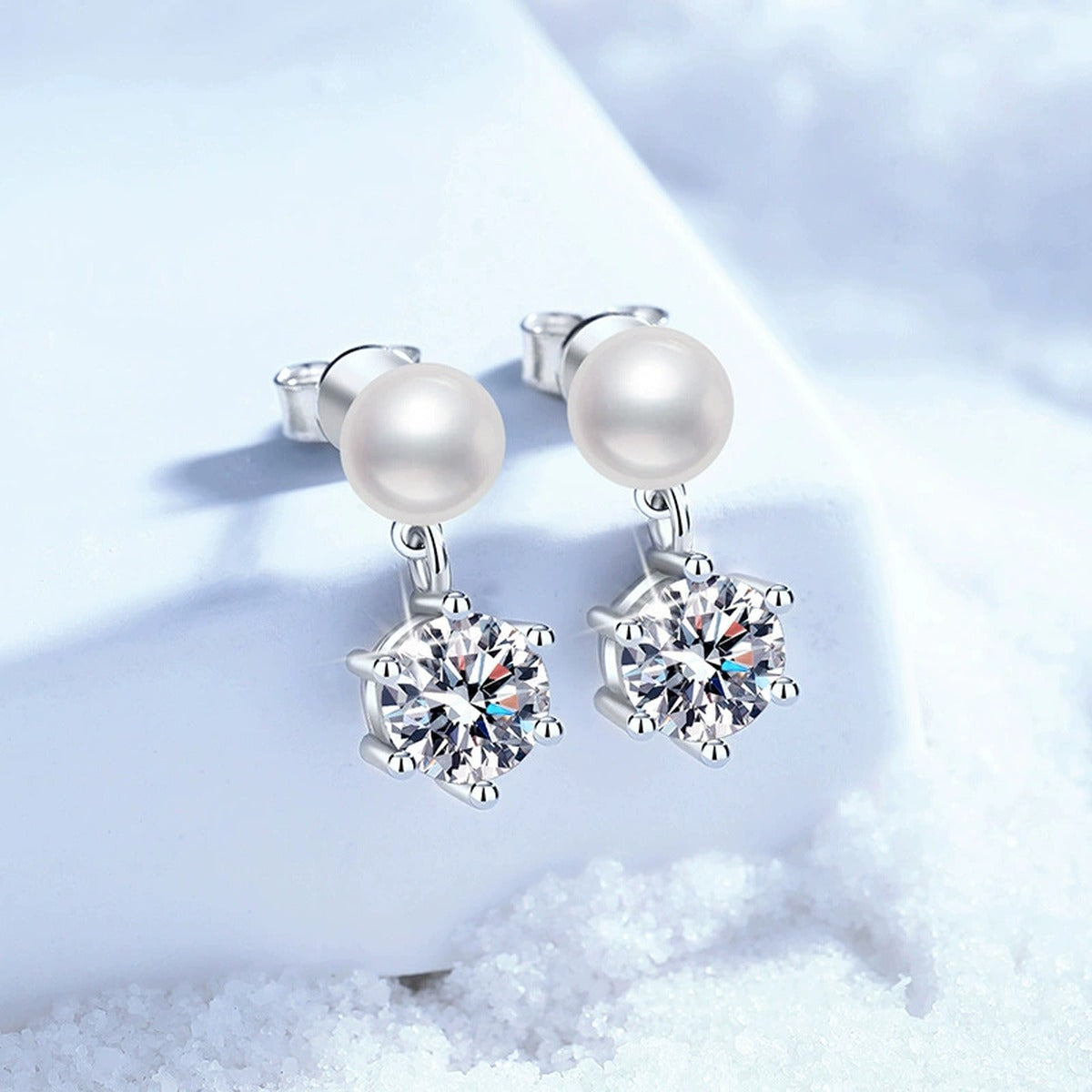 Pearl Moissanite Stud Drop Earrings in White Gold-Plated S925 Sterling Silver blue scene angled view