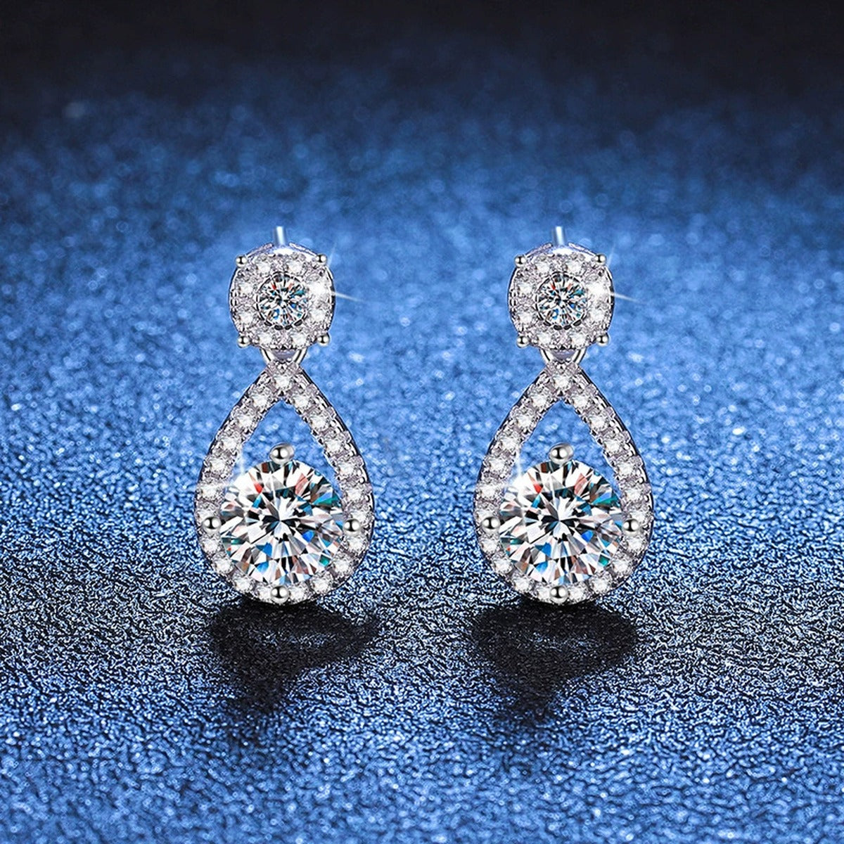 Teardrop Moissanite Drop Earrings with CZ in White Gold-Plated S925 blue scene angled view