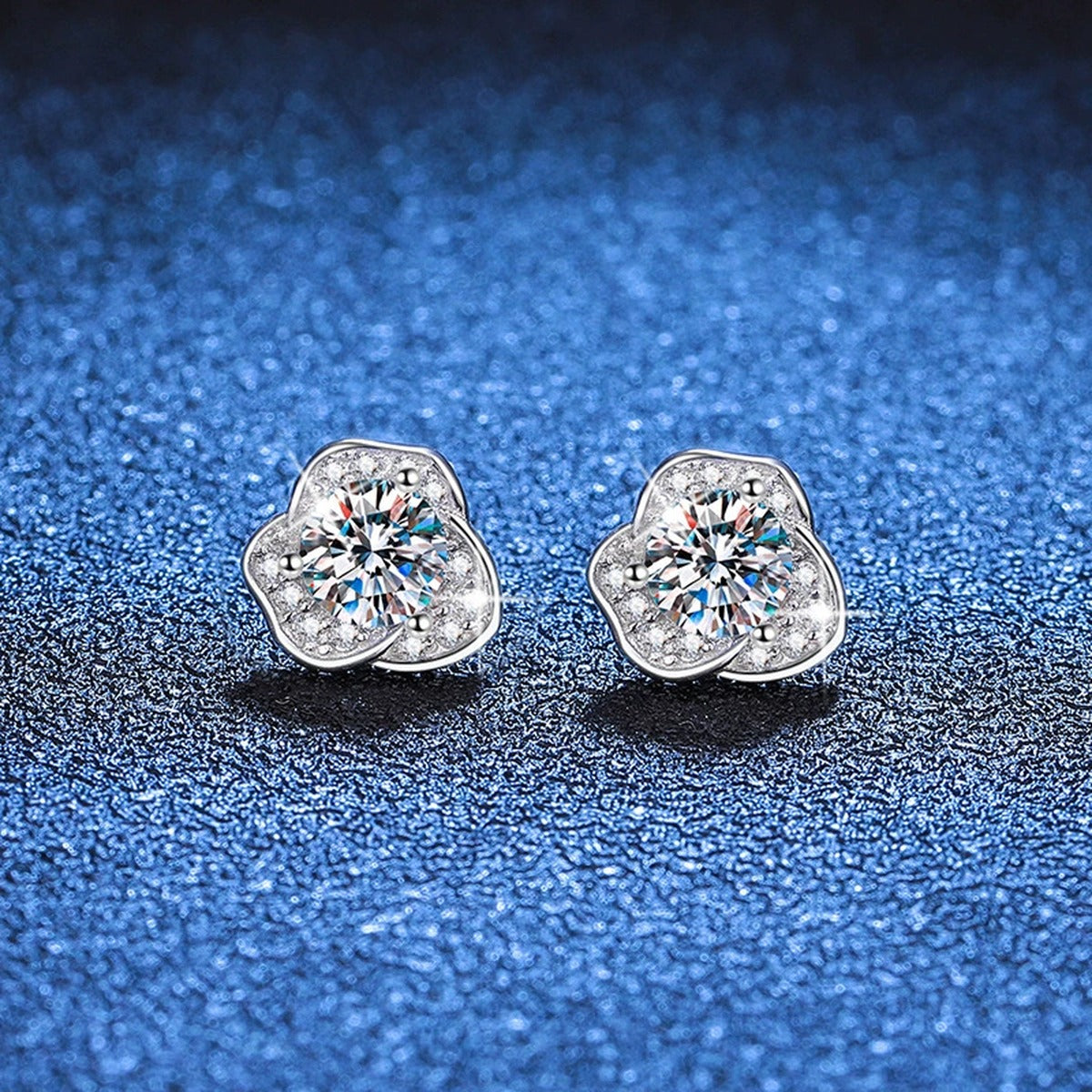Round Moissanite Stud Earrings with CZ in White Gold-Plated S925 Silver blue scene angled view