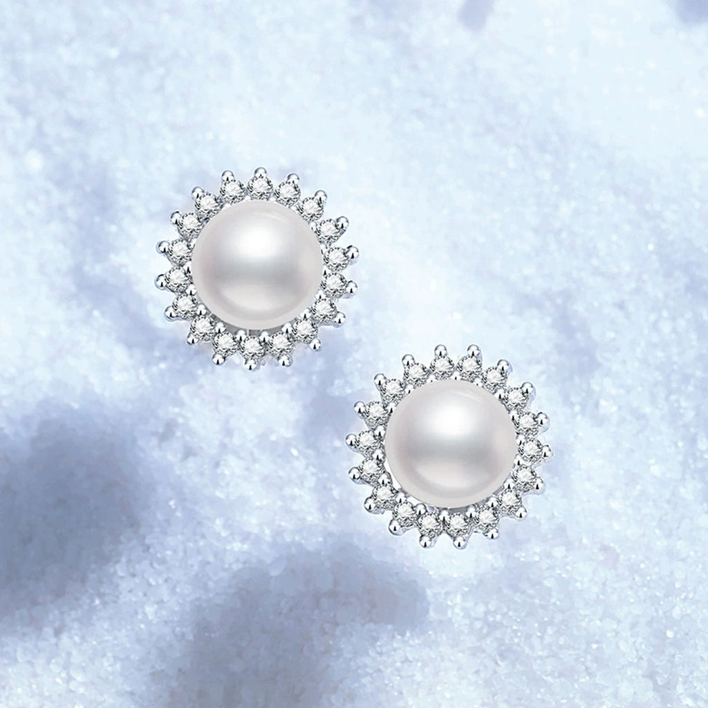Halo Pearl Stud Earrings with CZ in White Gold-Plated S925 Sterling Silver blue scene angled view