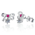 Pink CZ Moissanite Stud Earrings in White Gold-Plated S925 Silver on clean white background showing petite stud earrings with a round moissanite and pink CZ accents