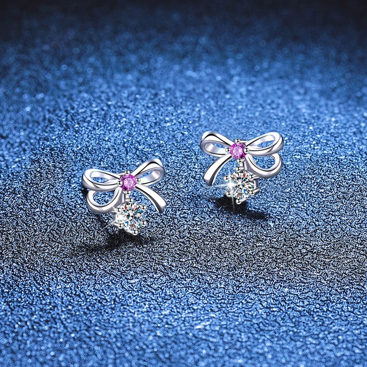Pink CZ Moissanite Stud Earrings in White Gold-Plated S925 Silver blue scene angled view
