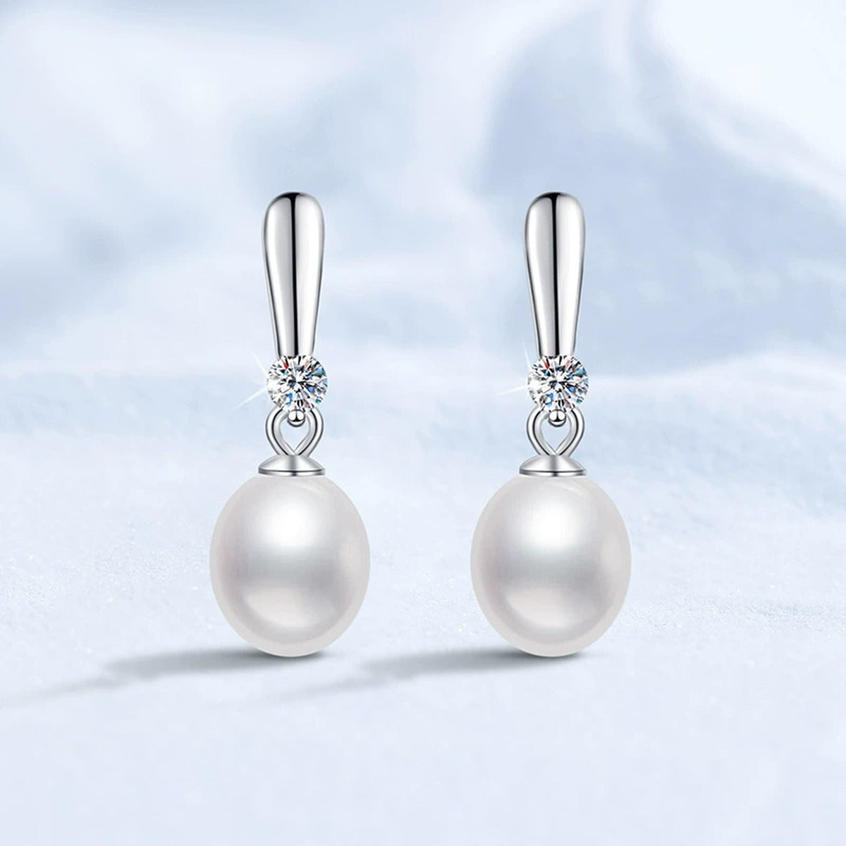 Slender Pearl Moissanite Hook Drop Earrings in White Gold-Plated S925 Sterling Silver close-up product detail view