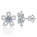 Floral Moissanite Stud Earrings with CZ in White Gold-Plated S925 Silver on clean white background showing flower-shaped stud earrings with a round moissanite center