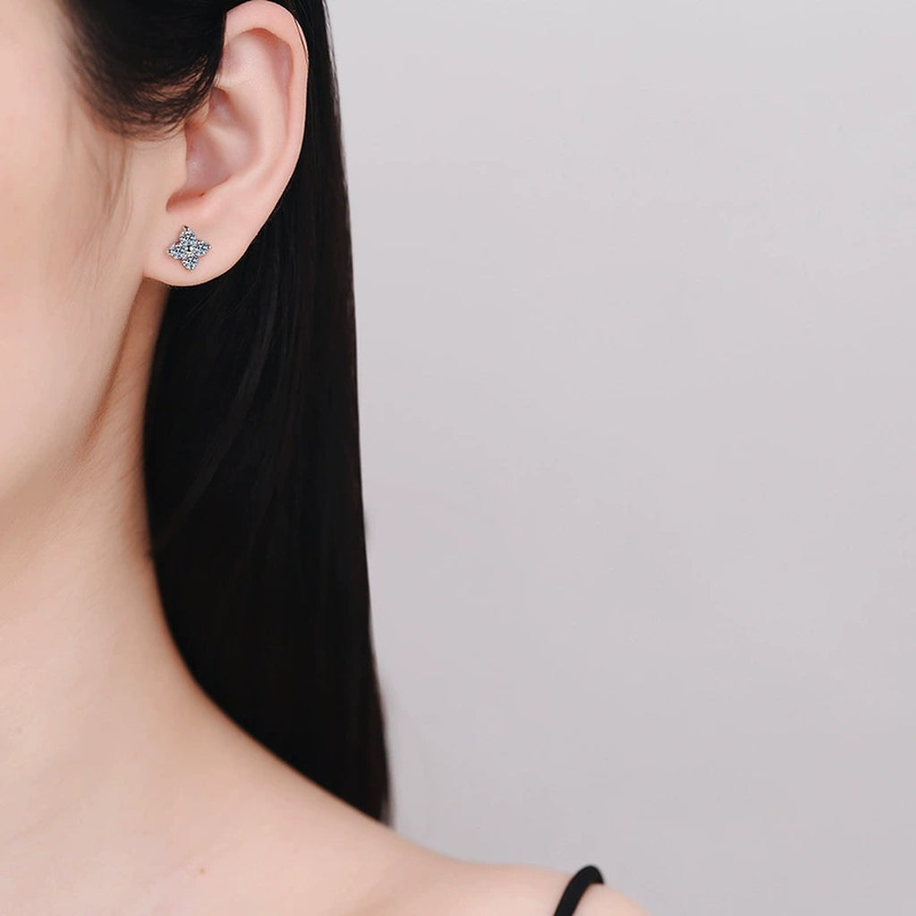 Floral Cluster Moissanite Stud Earrings in White Gold-Plated S925 Silver worn on ear by model