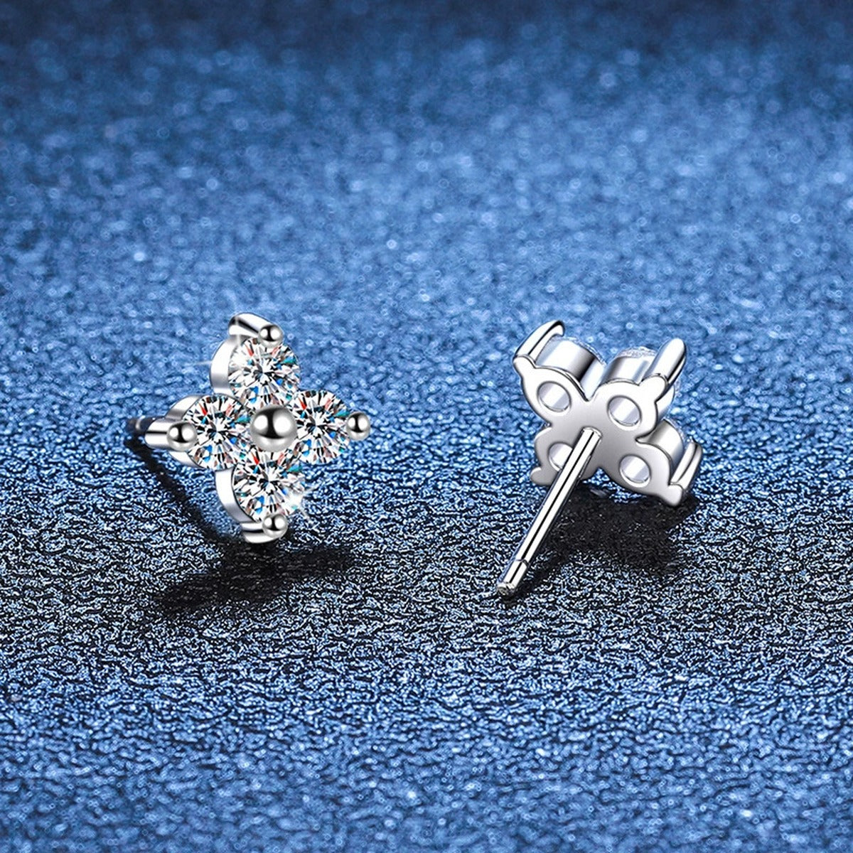 Floral Cluster Moissanite Stud Earrings in White Gold-Plated S925 Silver blue scene angled view