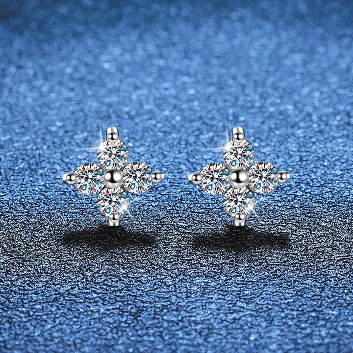 Floral Cluster Moissanite Stud Earrings in White Gold-Plated S925 Silver blue scene close-up view