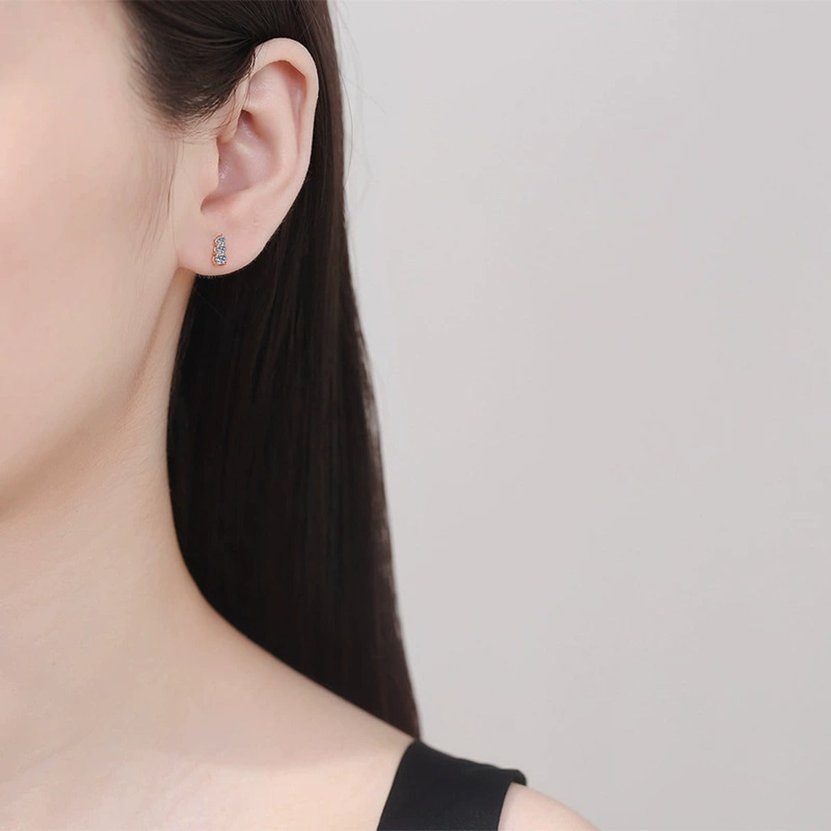 Champagne Gold Moissanite Hoop Earrings in S925 Sterling Silver worn on ear by model