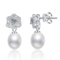 Floral Pearl Moissanite Stud Drop Earrings with CZ in White Gold-Plated S925 Sterling Silver on clean white background showing a floral moissanite top with a pearl drop