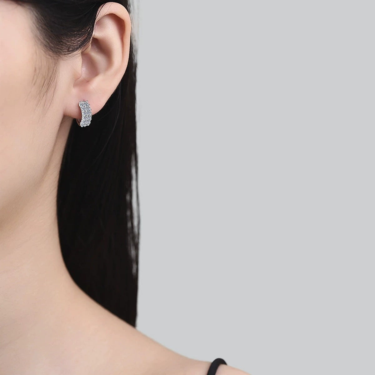 Pave Moissanite Hoop Earrings in White Gold-Plated S925 Sterling Silver worn on ear by model