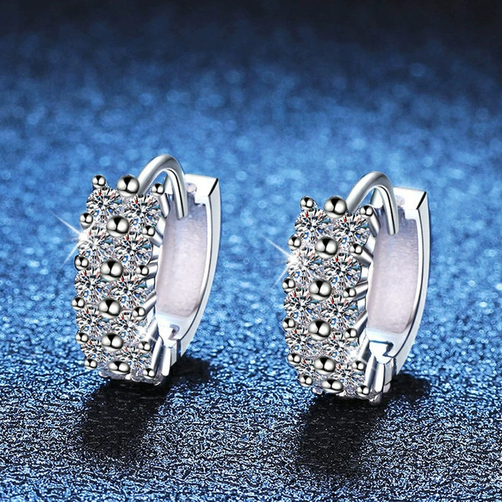 Pave Moissanite Hoop Earrings in White Gold-Plated S925 Sterling Silver blue scene close-up view