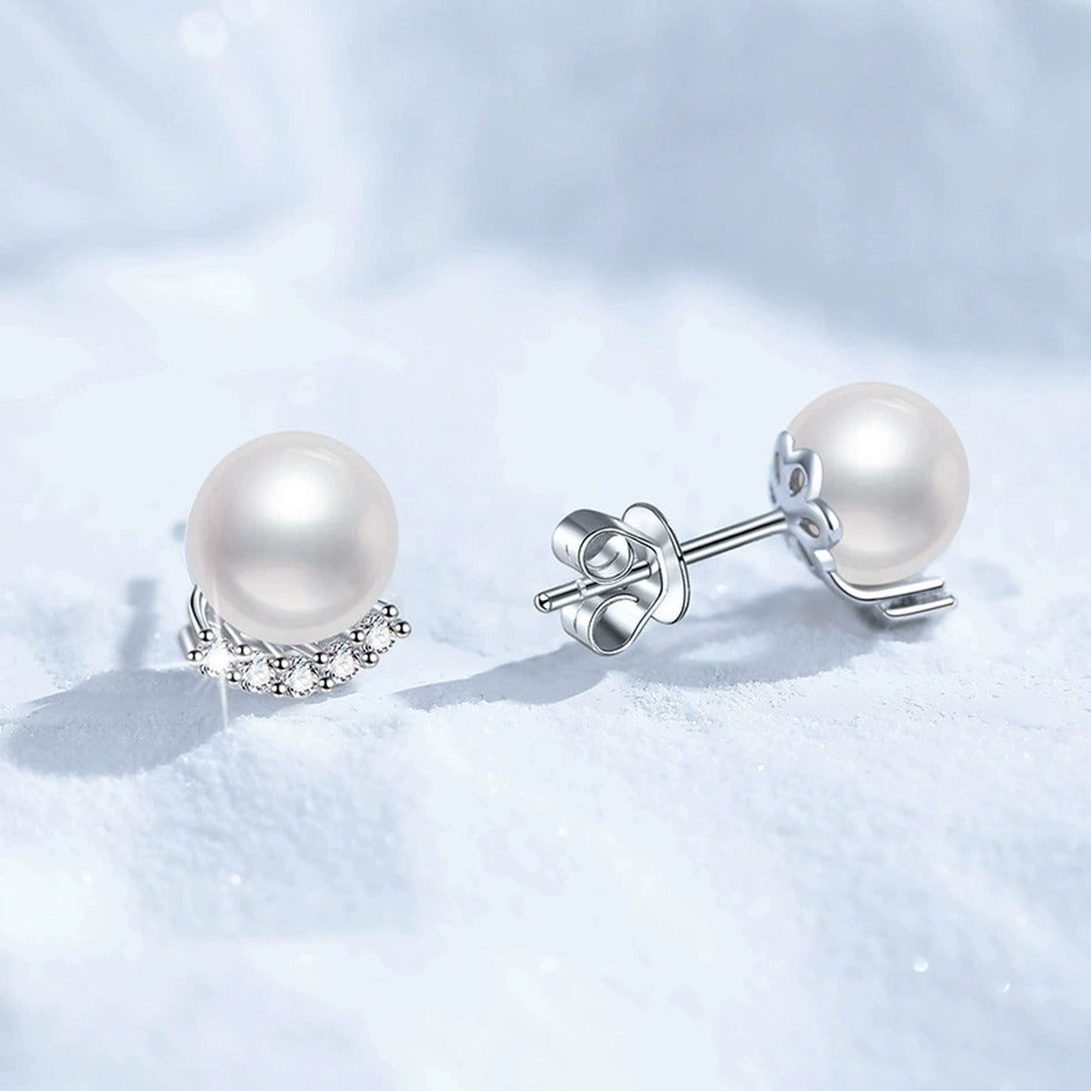 Pearl Moissanite Stud Earrings in White Gold-Plated S925 Sterling Silver blue scene angled view