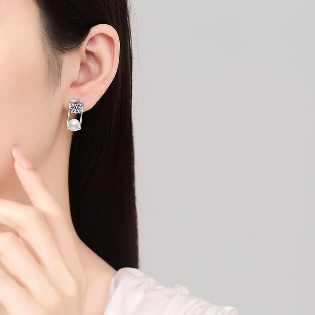 Rectangular Frame Pearl Moissanite Stud Earrings in White Gold-Plated S925 Sterling Silver worn on ear by model