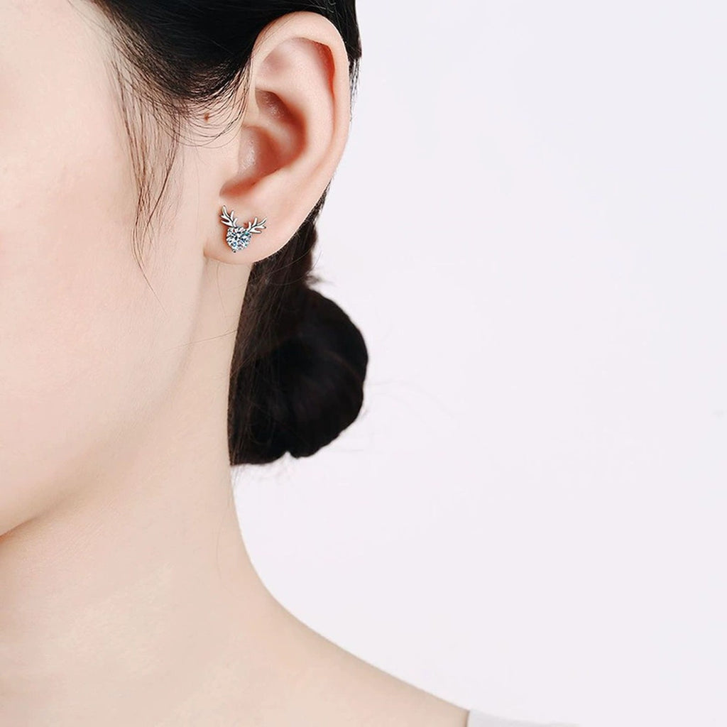 Antler Moissanite Stud Earrings in White Gold-Plated S925 Silver worn on ear by model