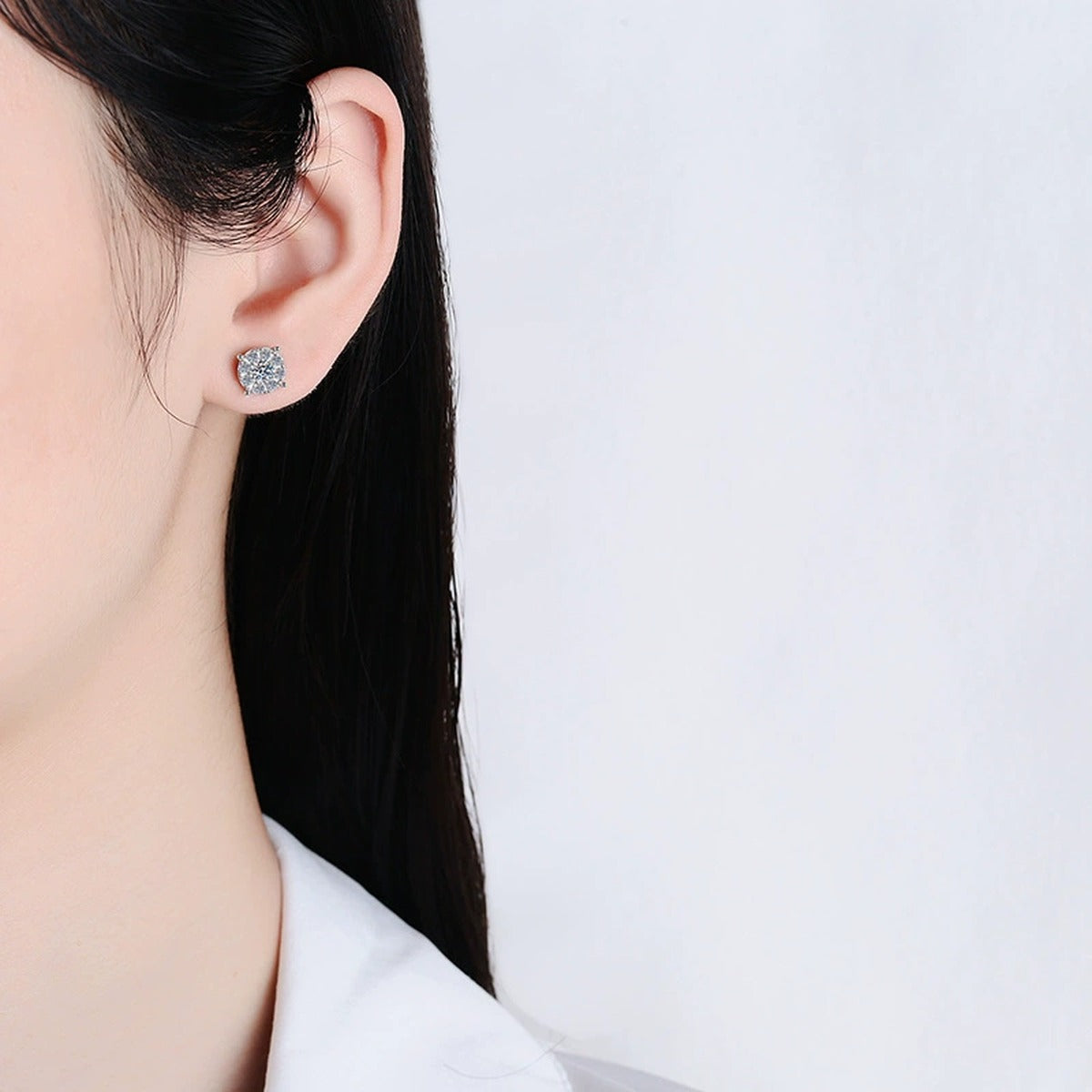 Square Cluster Moissanite Stud Earrings with CZ in White Gold-Plated S925 worn on ear by model