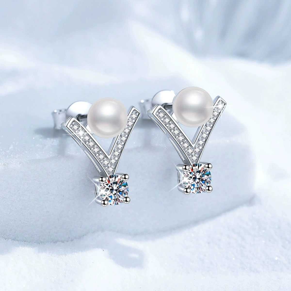 V-Shaped Pearl Moissanite Stud Earrings with CZ in White Gold-Plated S925 Sterling Silver blue scene product view