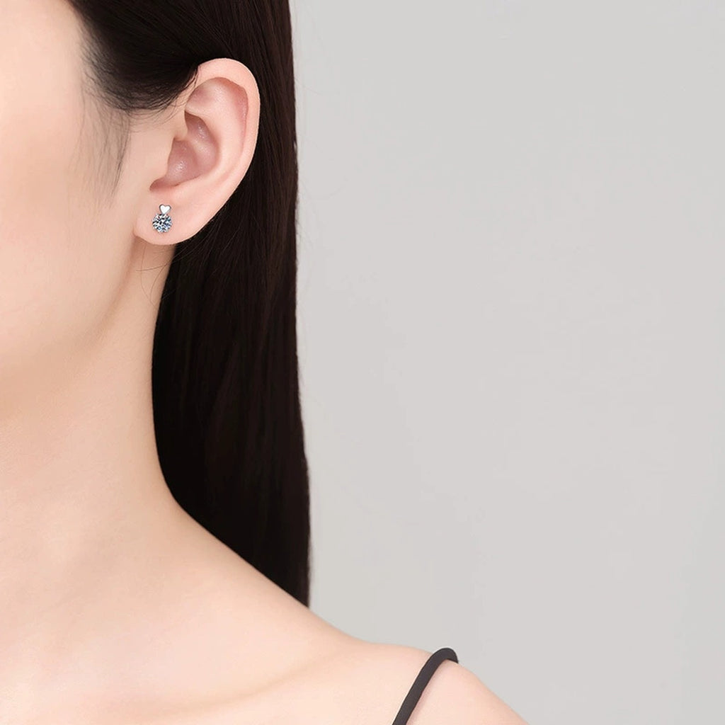 Floral Moissanite Stud Earrings in White Gold-Plated S925 Sterling Silver worn on ear by model