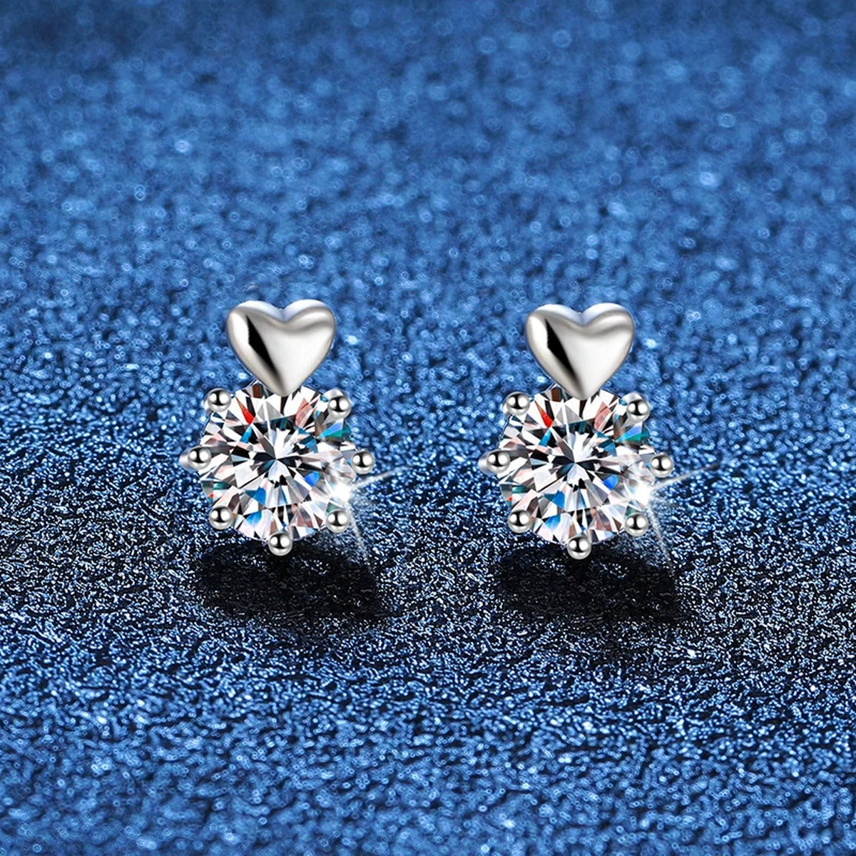 Floral Moissanite Stud Earrings in White Gold-Plated S925 Sterling Silver blue scene angled view