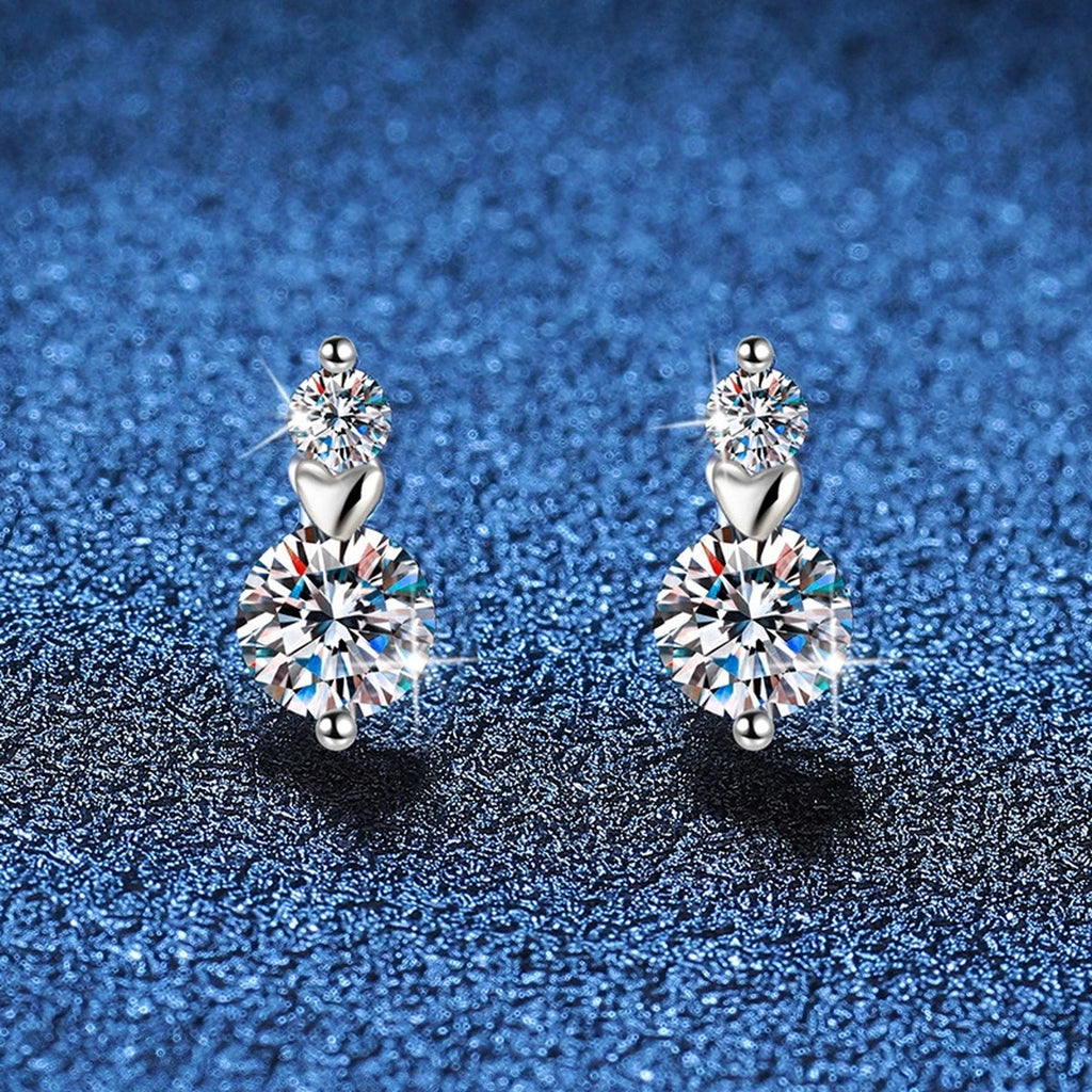 Pear Moissanite Stud Earrings with CZ in White Gold-Plated S925 Silver blue scene angled view