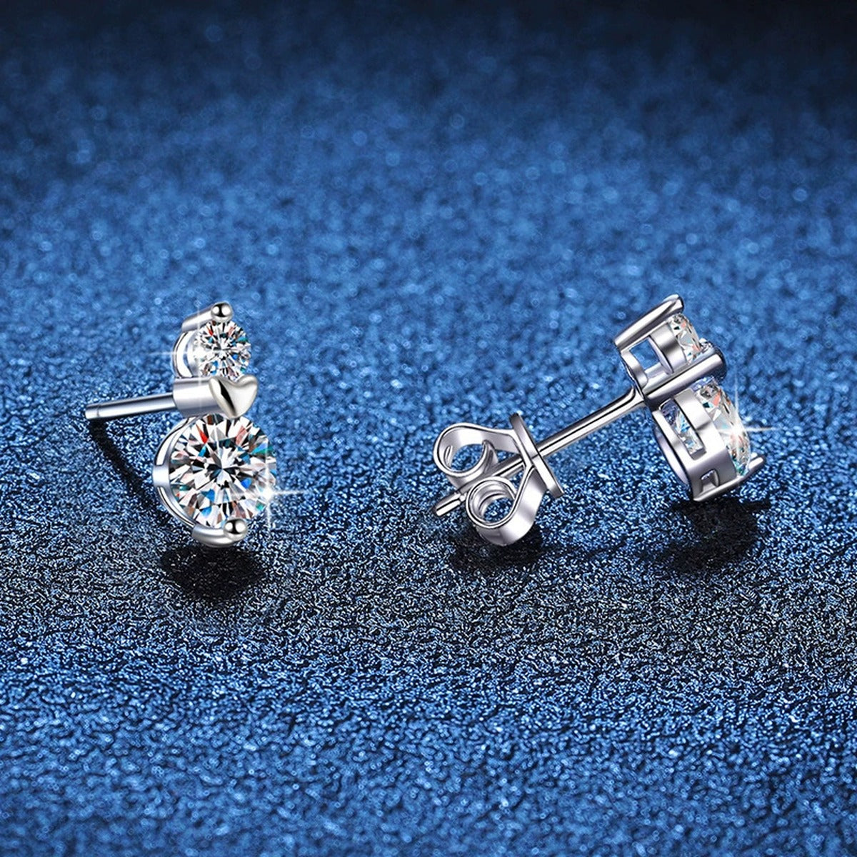 Pear Moissanite Stud Earrings with CZ in White Gold-Plated S925 Silver blue scene close-up view