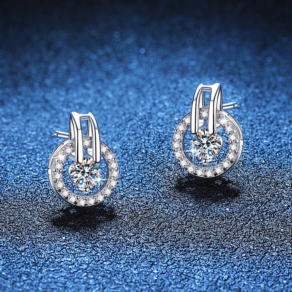 Round Moissanite Stud Earrings with CZ in White Gold-Plated S925 Silver blue scene angled view