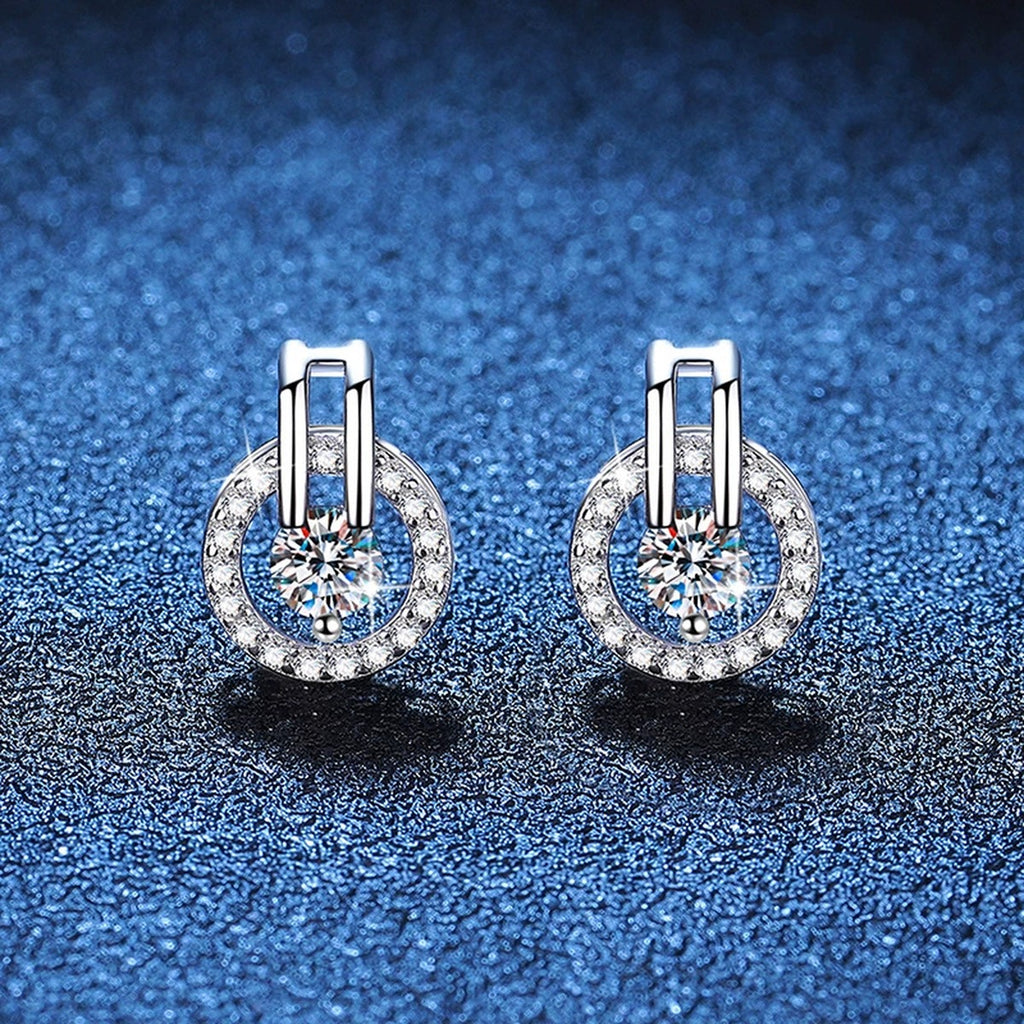 Round Moissanite Stud Earrings with CZ in White Gold-Plated S925 Silver blue scene close-up view