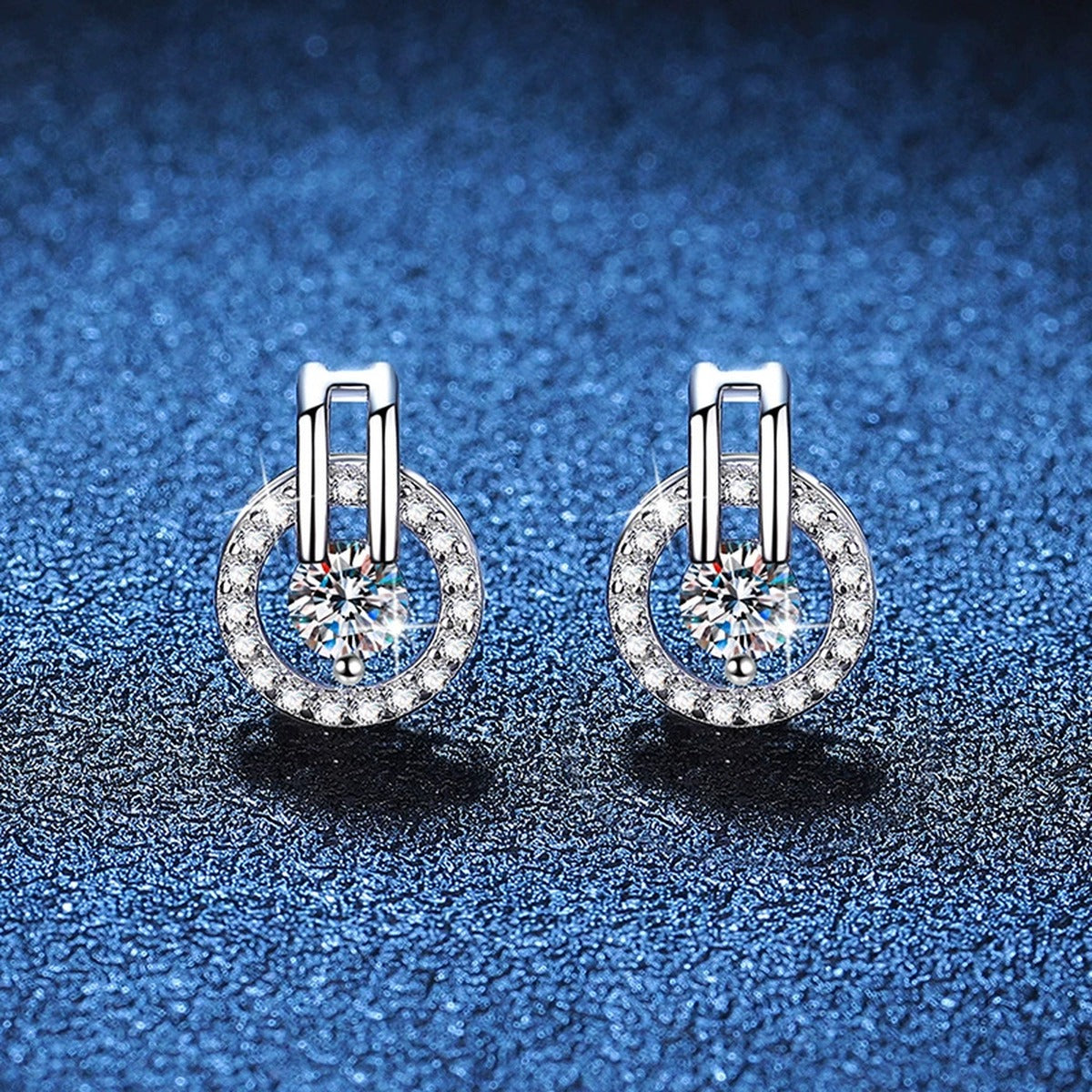 Round Moissanite Stud Earrings with CZ in White Gold-Plated S925 Silver blue scene close-up view