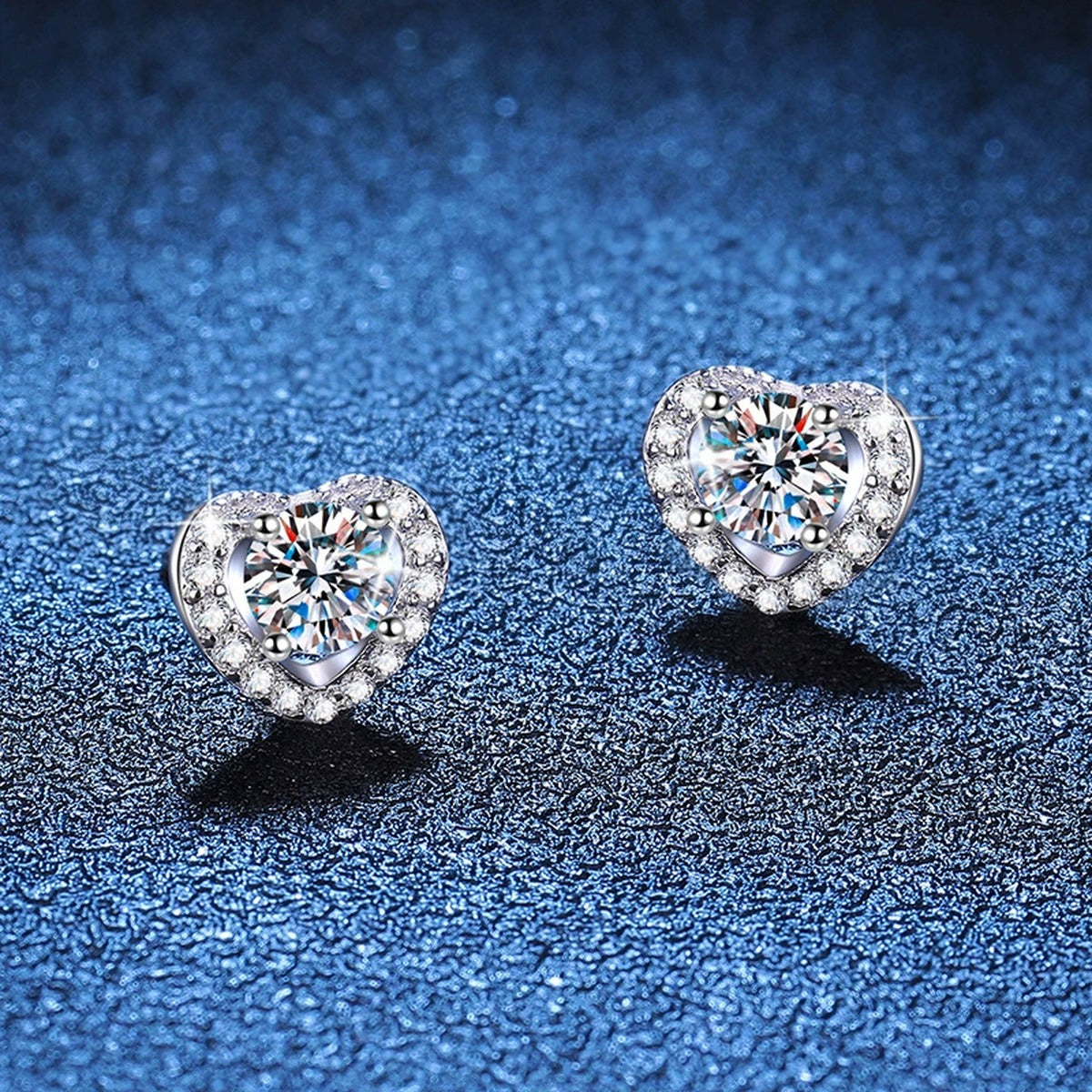 Heart Moissanite Stud Earrings with CZ in White Gold-Plated S925 Silver blue scene angled view