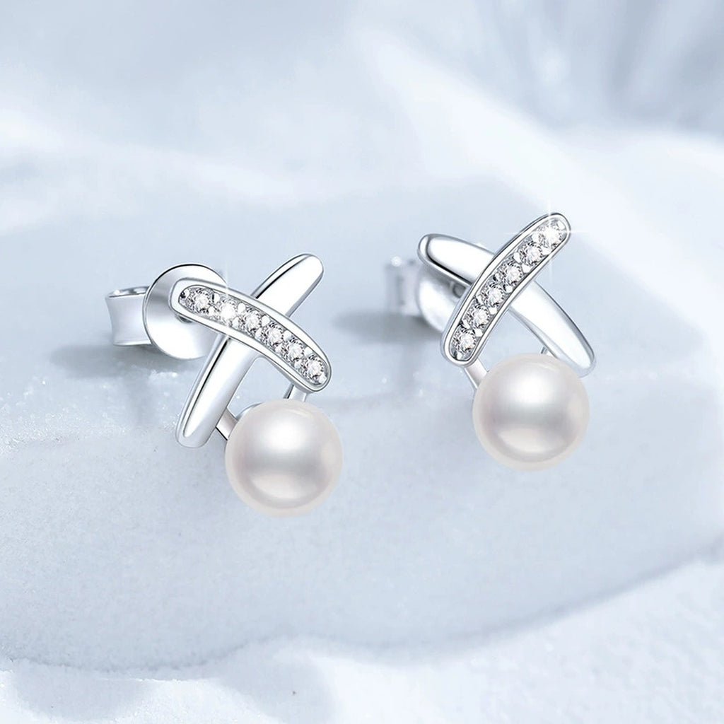 Cross Pearl Stud Earrings with CZ in White Gold-Plated S925 Sterling Silver blue scene product view