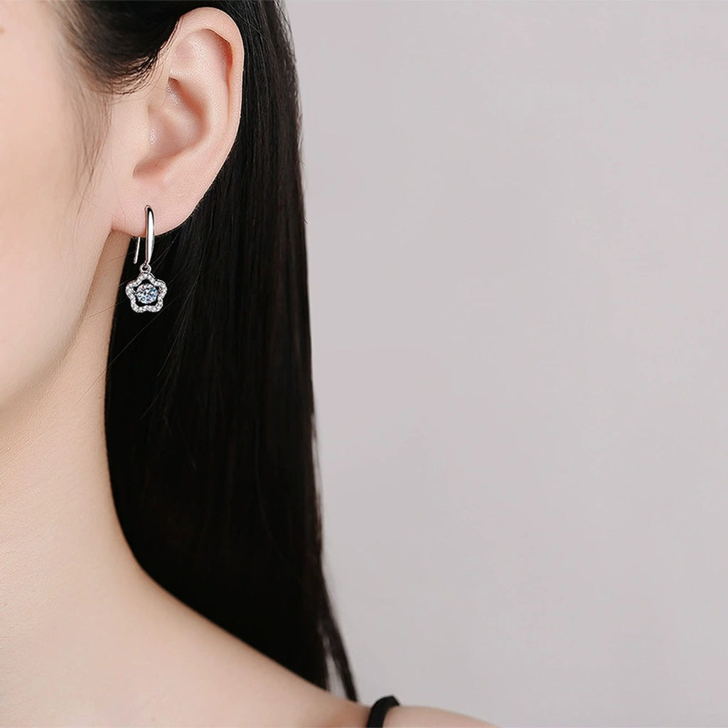 Floral Moissanite Drop Earrings with CZ in White Gold-Plated S925 Silver worn on ear by model