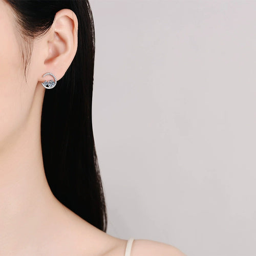 Moon Moissanite Stud Earrings with CZ in White Gold-Plated S925 Silver worn on ear by model