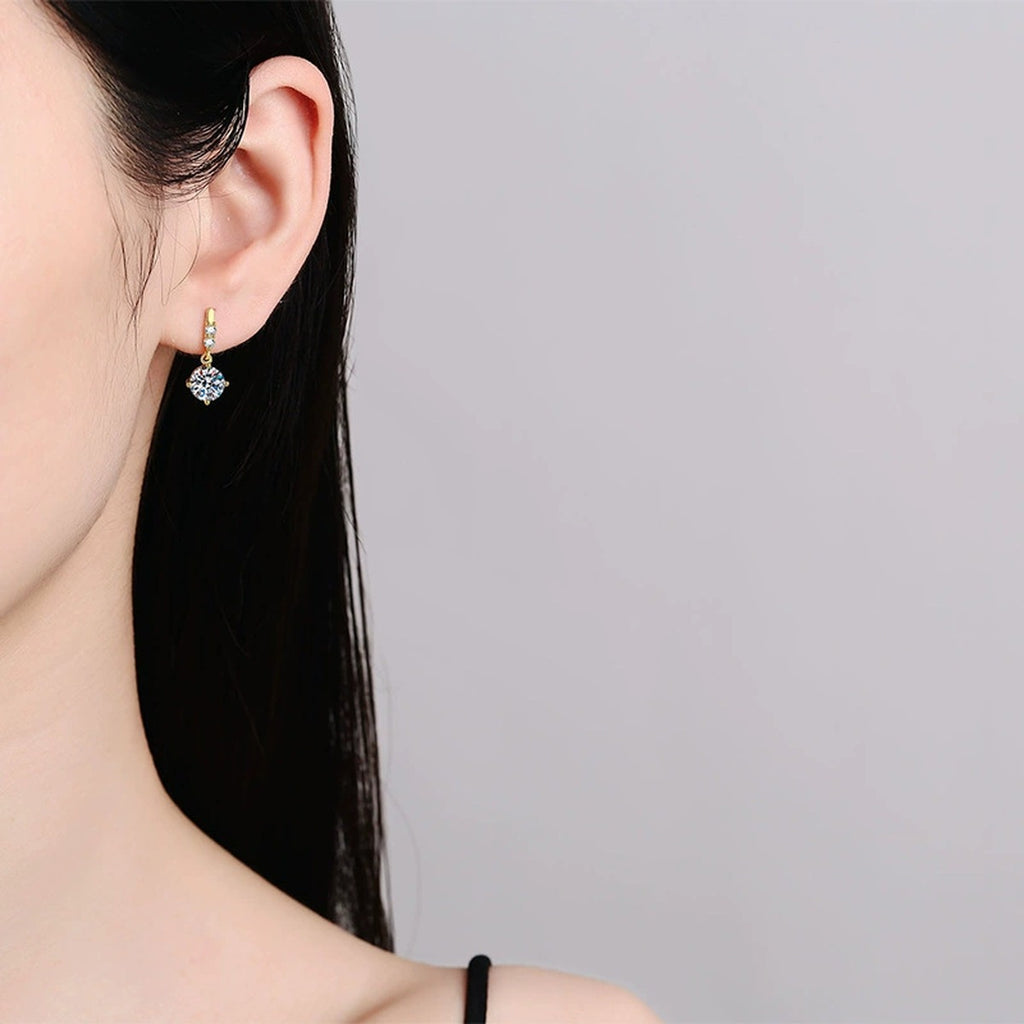 Floral Moissanite Drop Earrings with CZ in Gold-Plated S925 Silver worn on ear by model