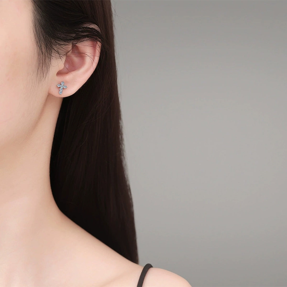 Floral Moissanite Stud Earrings in Gold-Plated S925 Sterling Silver worn on ear by model