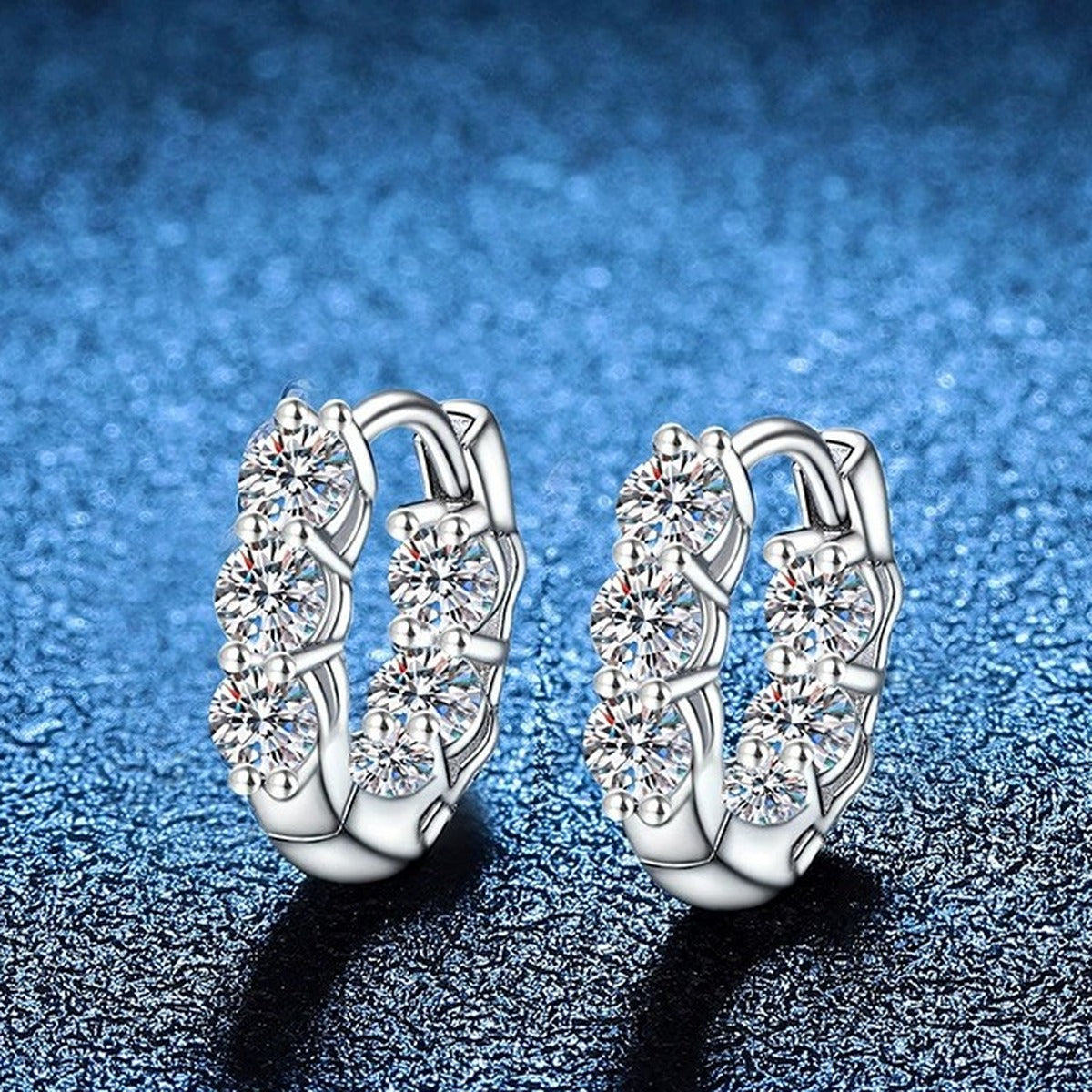 Oval Cluster Moissanite Hoop Earrings in Gold-Plated S925 Silver blue scene angled view