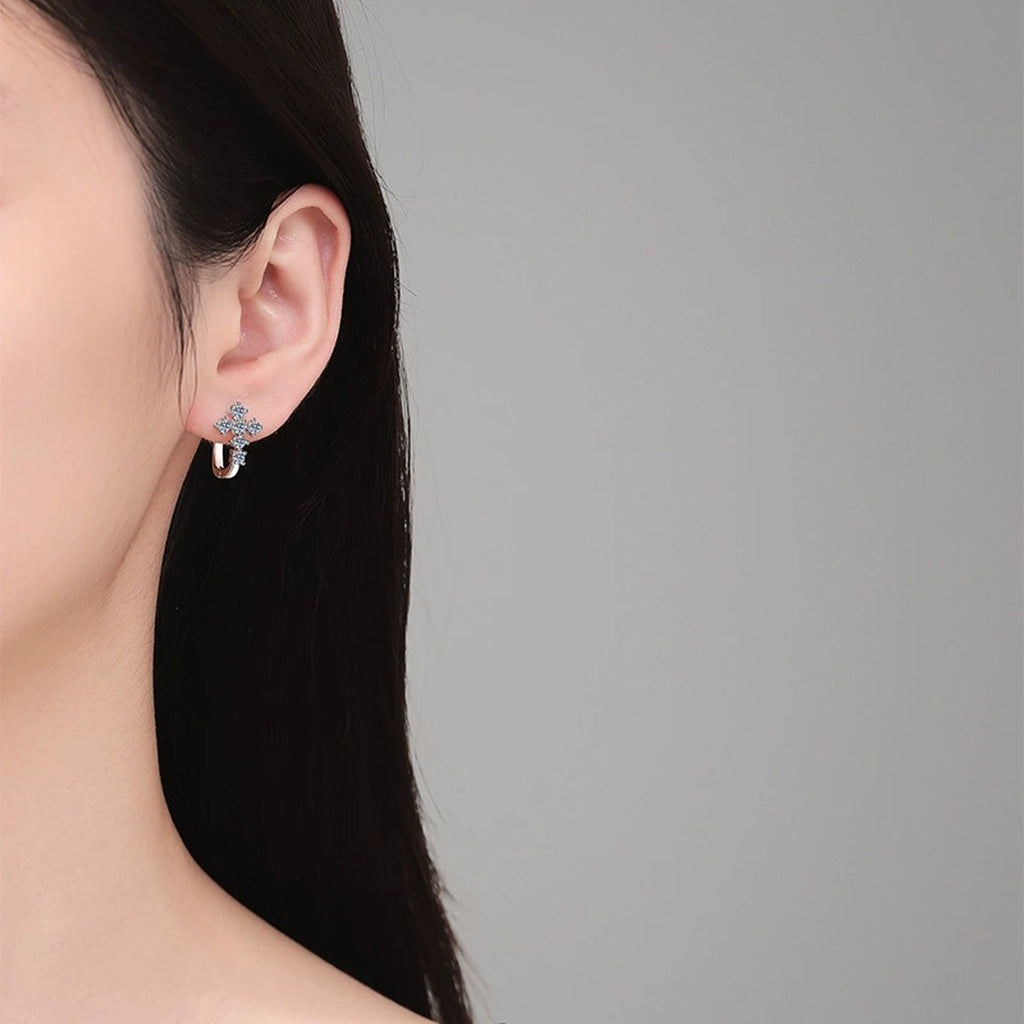 Moon Moissanite Stud Earrings in White Gold-Plated S925 Sterling Silver worn on ear by model