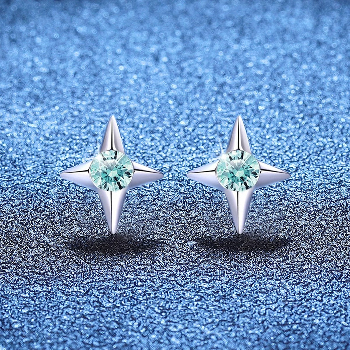 Green Moissanite Stud Earrings in White Gold-Plated S925 Silver blue scene angled view