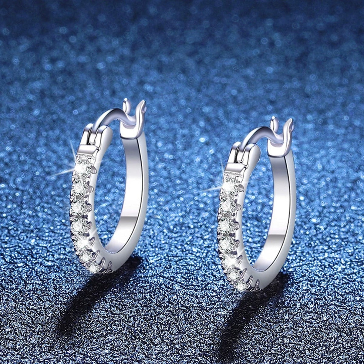 Pave Moissanite Hoop Earrings in White Gold-Plated S925 Sterling Silver blue scene angled view
