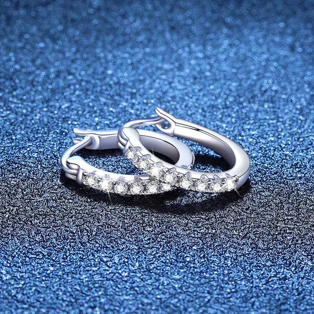 Pave Moissanite Hoop Earrings in White Gold-Plated S925 Sterling Silver blue scene close-up view