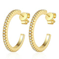 Pave Moissanite Hoop Earrings in Yellow Gold-Plated S925 Silver on clean white background showing yellow gold pave hoop earrings with a rounded silhouette